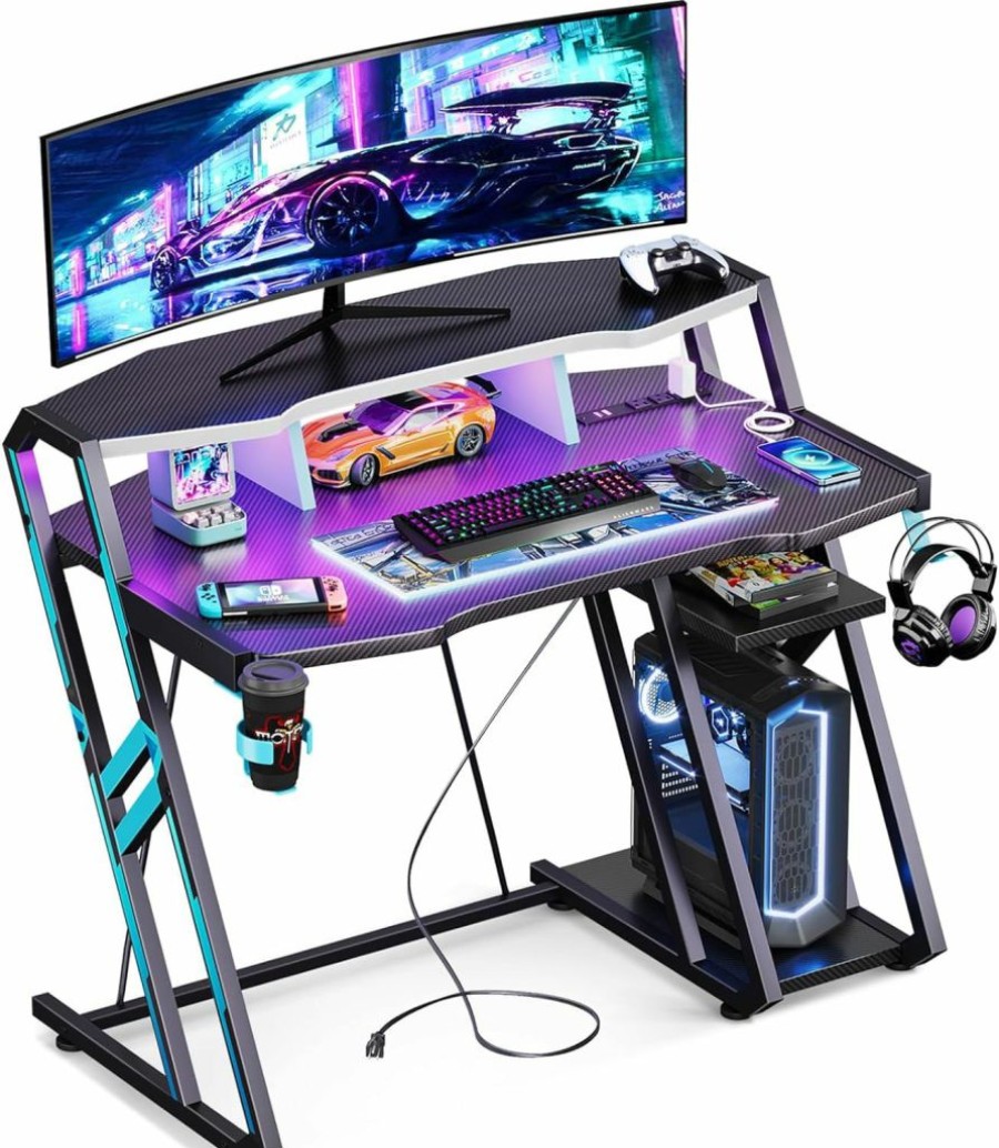 MOTPK | Motpk Gaming Desk With Power Outlet & Led Lights, Gaming Computer Desk 39Inch With Pc Storage Shelf, Gaming Table With Carbon Fiber Texture, Gamer Desk, Gift For Boys Men, Black